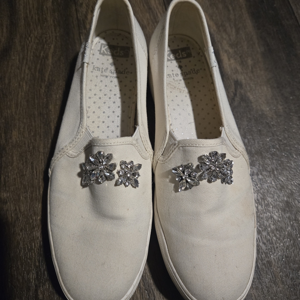 Kate Spade Women's Cream Slip-On Sneakers with Silver Embellishments 6.5
